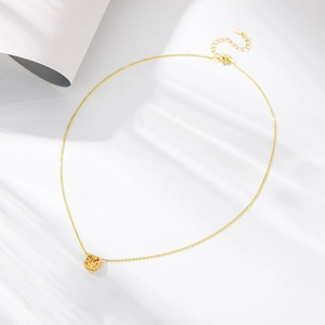 Detail showing square champagne zirconia pendant and S925 sterling silver chain