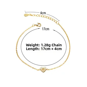 Detailed size specifications for the gold heart bracelet showing 17cm chain and 4cm extension