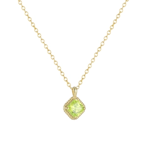 Detailed close-up of a geometric green square stone pendant with a golden rope textured frame