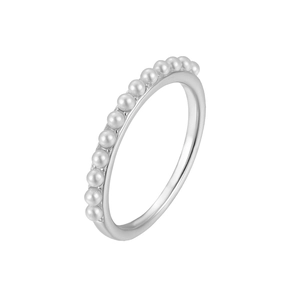 Detail view of 11 glossy white pearls set on a thin 925 sterling silver minimalist ring band