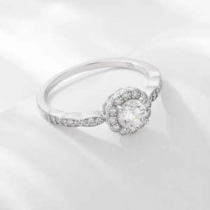 Elegant S925 sterling silver halo ring with pavé stones and wavy band design