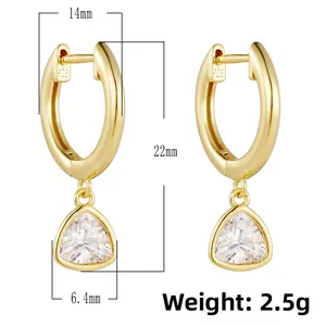 Macro shot of gold-plated S925 silver earrings with S925 hallmark and zircon charm