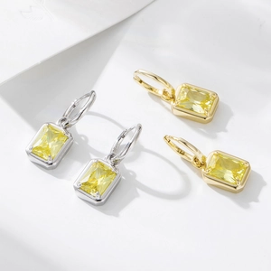 Silver and gold hoop earrings with square yellow zircon pendants and 925 hallmarks
