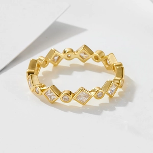 Close-up of geometric 925 sterling silver ring with cubic zirconia in gold finish