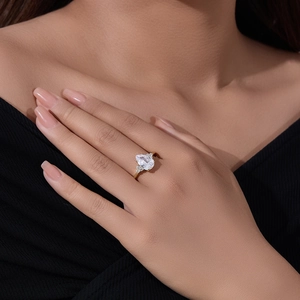 Macro detail of high-quality S925 silver pear-cut zircon ring worn by a model