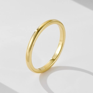 Minimalist s925 silver stackable ring with a polished gold finish and sleek mirror surface