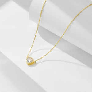 Detailed view of s925 silver geometric triangle zircon pendant necklace in gold