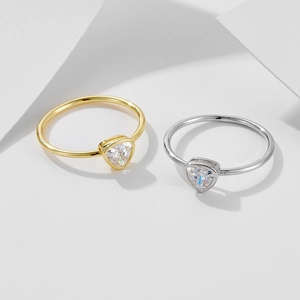 Minimalist 925 silver triangle diamond rings in gold and silver finishes from 45-degree angle