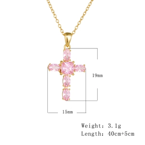 Detail view of pink zircon cross necklace with dimensions 19x15mm and 3.1g weight