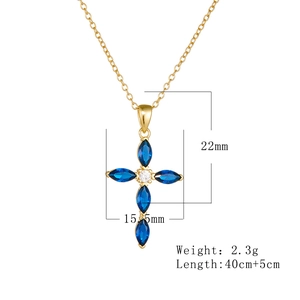 Detail view of gold cross pendant with blue marquise gems, 22mm height and 40+5cm chain