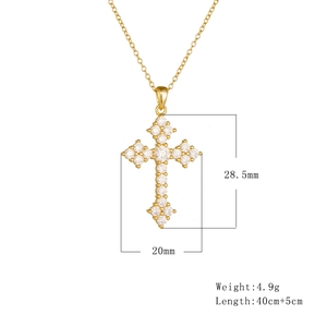 Detail view of gold cross pendant with dimensions and weight for crystal necklace