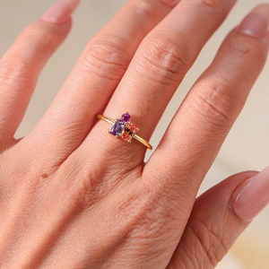 Elegant gold S925 silver ring featuring purple rectangular and pink round cubic zirconia