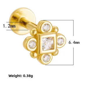 Detail view of gold flat back cartilage stud featuring square opal and zircon cluster