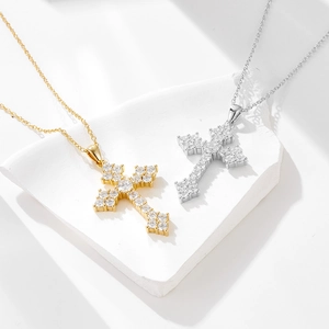 Cross pendant necklaces in gold and silver finish with pavé set cubic zirconia stones