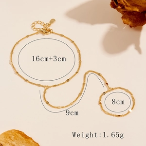 Detail of s925 silver slave bracelet with golden finish and engraved hallmarks