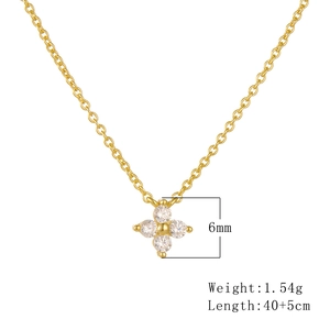 Detail showing 6mm clover pendant in 14K gold plated silver with CZ stones and 40cm chain
