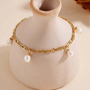 Bracelet élégant en argent S925 plaqué or 18K avec quatre perles baroques sur un vase