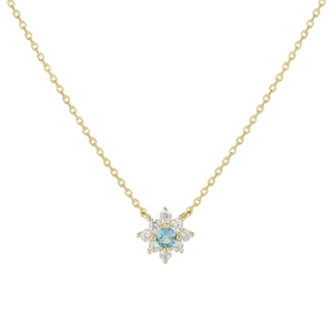 Elegant gold flower necklace with blue topaz center stone and zircon petals for women