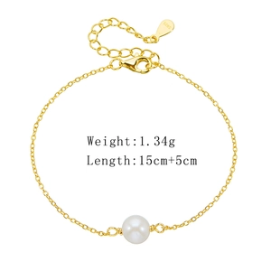 Detailed view of S925 silver gold pearl bracelet with lobster clasp and extension chain