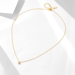 925 silver 14K gold clover necklace with zircon flower pendant on white background