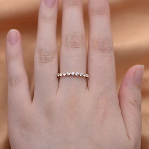 Close-up of 2.5mm full zircon eternity ring in gold plating worn on finger