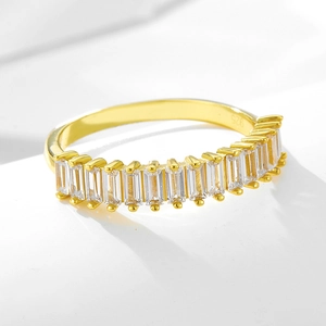 925 silver gold plated ring with baguette-cut zircon stones in a modern channel setting