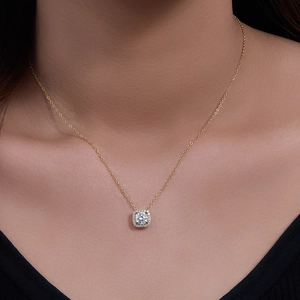 Elegant gold S925 silver necklace with square halo zircon pendant on a model neck