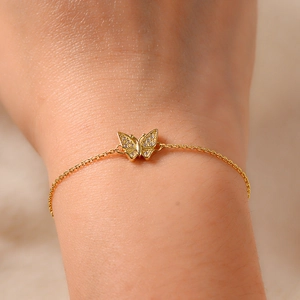 Detailed view of s925 silver butterfly bracelet with shimmering cubic zirconia accents