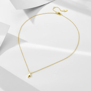 Detailed close-up of S925 sterling silver lightning bolt pendant with gold plating finish