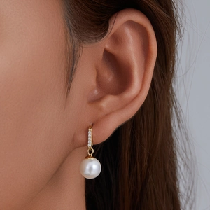 Elegant 925 sterling silver pearl drop earrings with sparkling pavé cubic zirconia