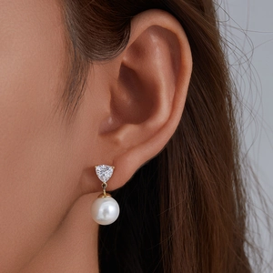 Elegant 925 silver pearl drop earrings with triangle zircon and golden finish