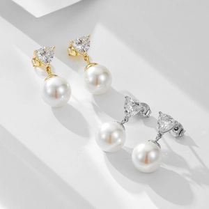 Elegant 925 sterling silver pearl earrings with heart-shaped zircon studs in gold and silver