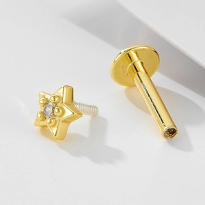 Macro shot of 925 sterling silver star flat back earring with internal threading