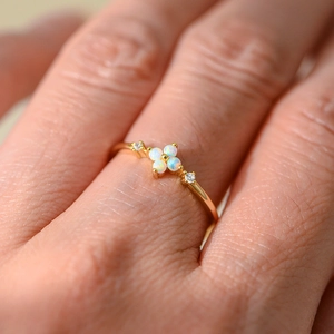 Elegant S925 silver gold-plated clover ring featuring white opal flowers and zircons