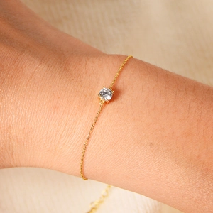 Minimalist S925 sterling silver gold bracelet with a single sparkling cubic zirconia stone