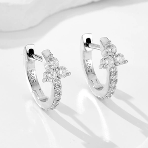 Elegant S925 silver hoop earrings featuring triple zircon clusters and pave setting