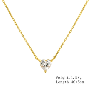 Detailed view of heart-shaped zircon necklace with gold-tone chain and 1.58g weight