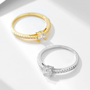 Minimalist S925 silver rings with round cubic zirconia in gold and silver finishes
