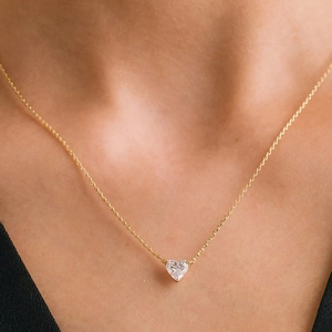 Classic S925 sterling silver gold plated necklace featuring a heart-cut zircon pendant