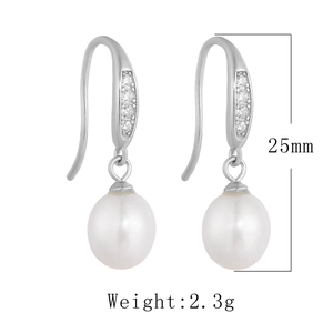 Detail view of S925 sterling silver drop earrings with freshwater pearls and 25mm length