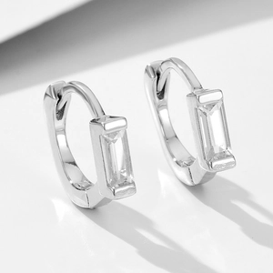 S925 sterling silver huggie earrings with baguette-cut cubic zirconia in a silver finish