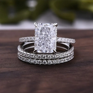 Luxury S925 silver 3-piece ring set with radiant ice cut zircon on wooden background