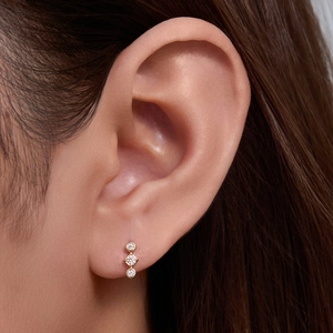 Minimalist S925 silver geometric diamond stud earrings shown on ear for style