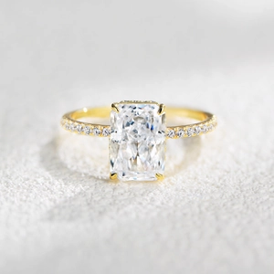 Macro shot of s925 silver ring set with radiant cut zircon and pave-set band