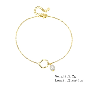 Detail of 925 silver gold anklet with natural pearl charm and S925 hallmark
