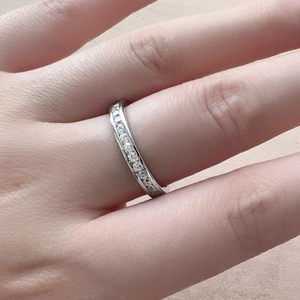 Eternity ring in 925 sterling silver with 2mm cubic zirconia crystals worn by model