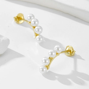 Elegant gold S925 sterling silver stud earrings featuring four white pearls in arc row
