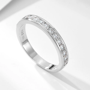 Minimalist 925 sterling silver ring with 2mm round cubic zirconia in channel setting