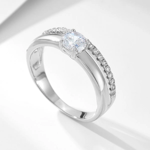 Elegant S925 silver ring featuring a round zircon center stone and side row diamonds
