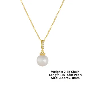 Detail of 8mm pearl pendant necklace with diamond accents and 40cm plus 5cm gold chain